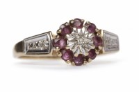 Lot 249 - NINE CARAT GOLD RUBY DRESS RING with a central...
