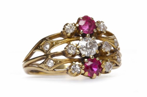 Lot 252 - RUBY AND DIAMOND RING the central round...