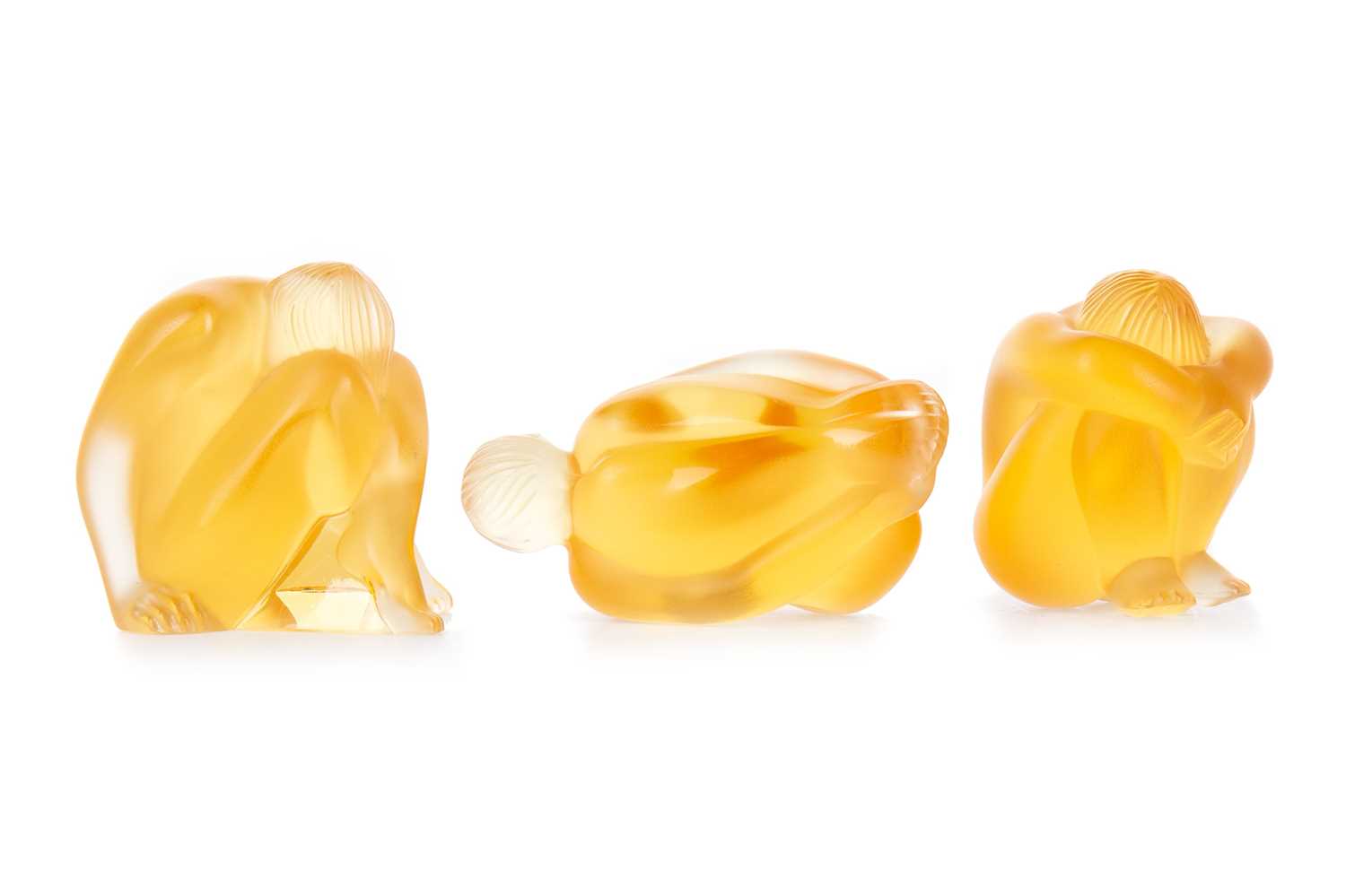 Lot 1343 - LALIQUE, SET OF THREE AMBER TINTED NUDE FIGURES