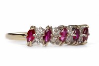 Lot 296 - NINE CARAT GOLD RUBY AND DIAMOND RING set with...