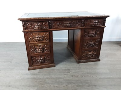 Lot 473 - OAK CARVED PEDESTAL DESK