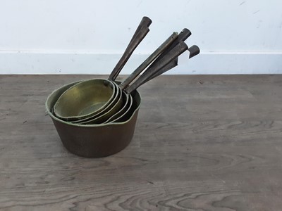 Lot 471 - SET OF SIX GRADUATING BRASS SAUCEPANS