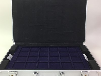 Lot 503 - GROUP OF THREE ALUMINIUM COIN CARRS CASES