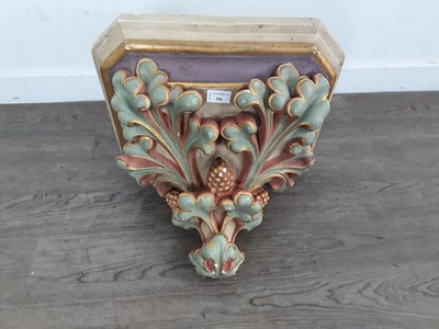 Lot 556 - PAINTED PLASTER WALL BRACKET
