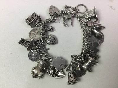 Lot 615 - SILVER CHARM BRACELET