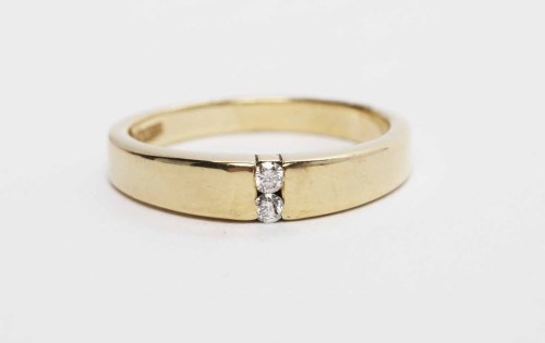 Lot 334 - DIAMOND SET BAND the tapered band with two...