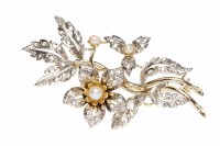 Lot 360 - PEARL AND DIAMOND FLORAL SPRAY BROOCH set with...
