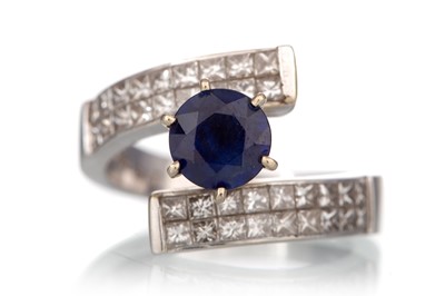Lot 521 - CONTEMPORARY SAPPHIRE AND DIAMOND RING