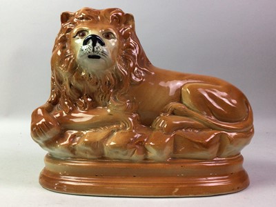 Lot 56 - STAFFORDSHIRE POTTERY LION