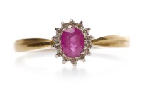 Lot 380 - RUBY AND DIAMOND CLUSTER RING with an oval cut...