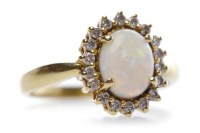 Lot 382 - OPAL AND DIAMOND RING the oval shaped opal...
