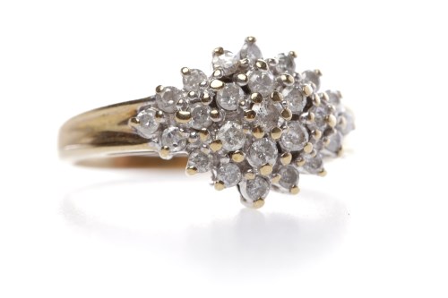 Lot 386 - DIAMOND CLUSTER RING with round brilliant cut...
