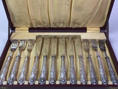 Lot 334 - GEORGE V SET OF SILVER HANDLED FORKS AND KNIVES