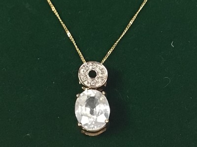 Lot 345 - NINE CARAT GOLF TOPAZ AND DIAMOND NECKLACE