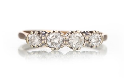 Lot 569 - DIAMOND FOUR STONE RING