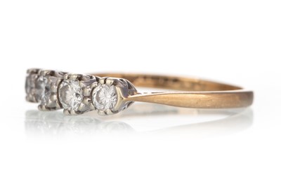 Lot 569 - DIAMOND FOUR STONE RING