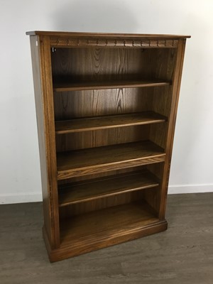 Lot 375 - ERCOL CARVED OAK OPEN BOOKCASE