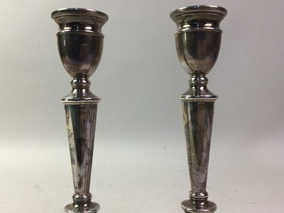 Lot 552 - PAIR OF ELIZABETH II SILVER CANDLESTICKS