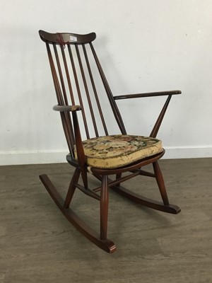 Lot 521 - DARK STAINED ERCOL ROCKING CHAIR