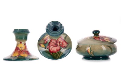 Lot 1407 - MOORCROFT, BOWL AND PAIR OF CANDLESTICKS