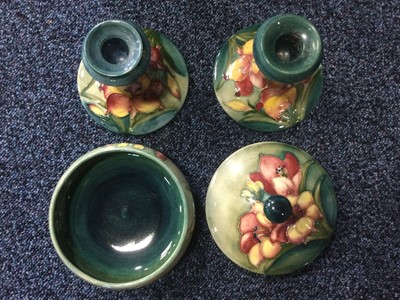 Lot 1407 - MOORCROFT, BOWL AND PAIR OF CANDLESTICKS