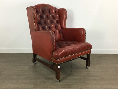 Lot 610 - OXBLOOD WINGBACK ARMCHAIR