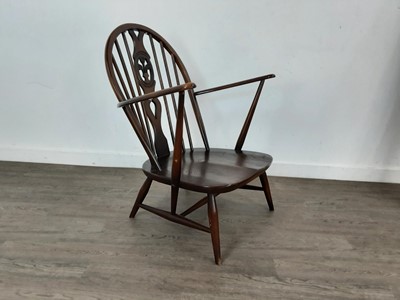 Lot 127 - ERCOL DARK STAINED ARMCHAIR