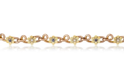 Lot 596 - GEM SET FLOWER BRACELET