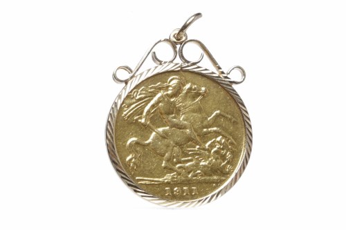Lot 530 - GOLD HALF SOVEREIGN DATED 1911 in a nine carat...