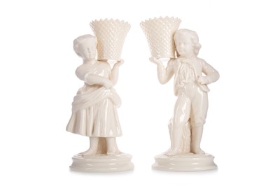 Lot 1430 - PAIR OF BELLEEK WHITE PORCELAIN FIGURAL SPILLS