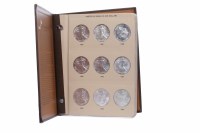 Lot 559 - BOOK OF USA SILVER DOLLAR COINS with 36 coins...