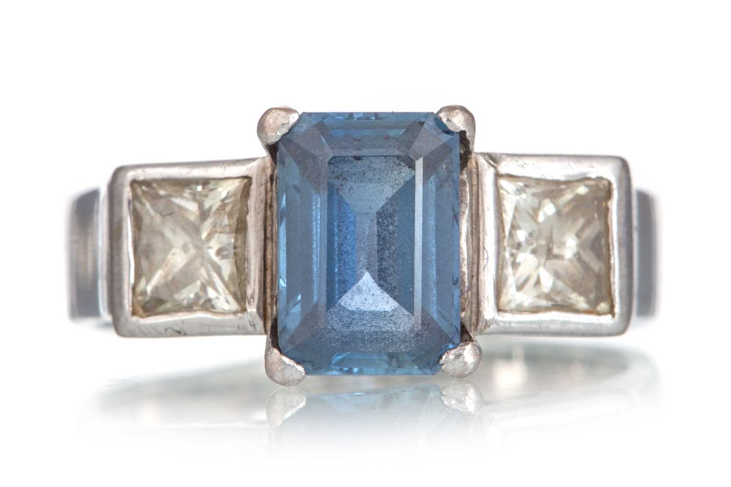 Lot 544 - BLUE GEM SET AND DIAMOND RING