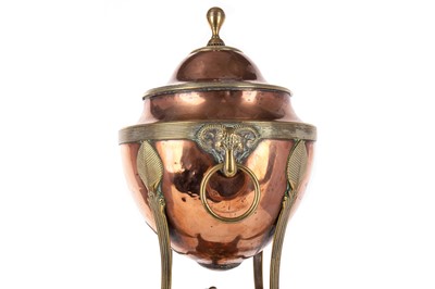 Lot 1448 - REGENCY EGYPTIAN REVIVAL COPPER AND BRASS URN