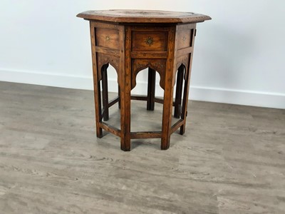 Lot 631 - CARVED OCTAGONAL FOLDING TABLE