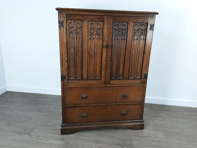 Lot 699 - REPRODUCTION OAK CUPBOARD