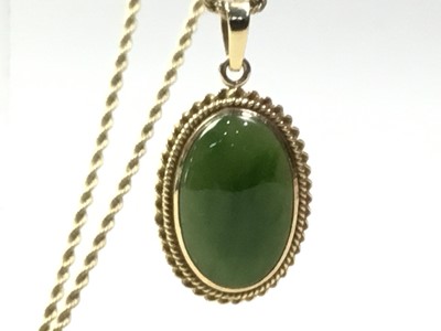 Lot 717 - FIFTEEN CARAT GOLD OVAL PENDANT