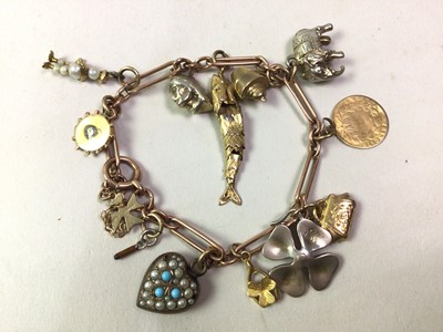 Lot 788 - GOLD CHARM BRACELET