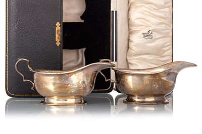 Lot 1305 - PAIR OF GEORGE V SILVER SAUCE BOATS