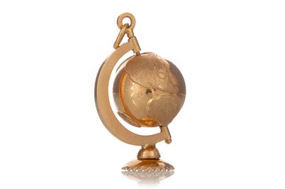 Lot 448 - GOLD SPINNING GLOBE PENDANT