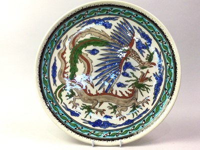 Lot 324 - STUDIO POTTERY CHARGER DEPICTING A DRAGON