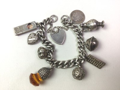 Lot 295 - SILVER CHARM BRACELET