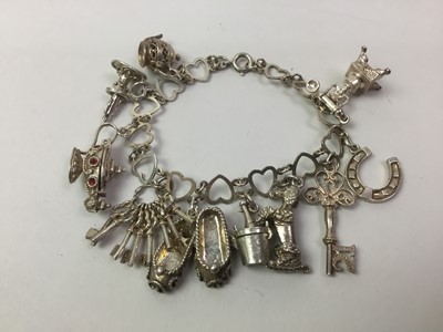 Lot 358 - SILVER CHARM BRACELET