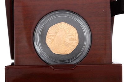 Lot 142 - PADDINGTON AT THE STATION GOLD PROOF 50P COIN