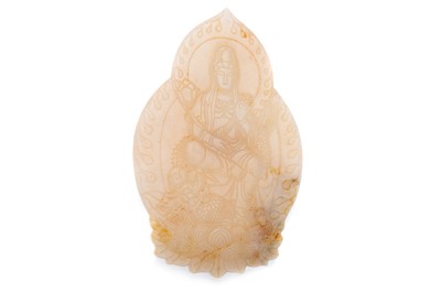Lot 933 - CHINESE RUSSET SOAPSTONE GUANYIN PLAQUE