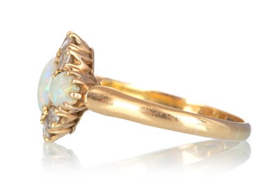 Lot 431 - OPAL AND DIAMOND RING
