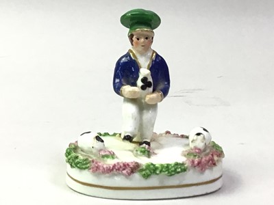 Lot 421 - PORCELAIN FIGURE OF A BOY AND RABBITS