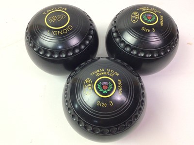 Lot 465 - THOMAS TAYLOR SET OF FOUR LIGNOID LAWN BOWLS