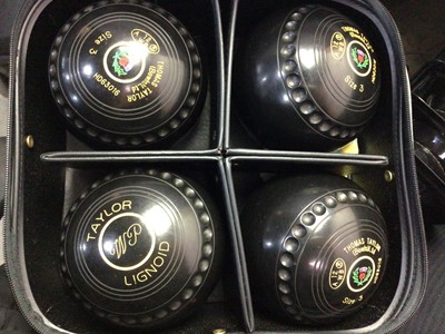 Lot 465 - THOMAS TAYLOR SET OF FOUR LIGNOID LAWN BOWLS
