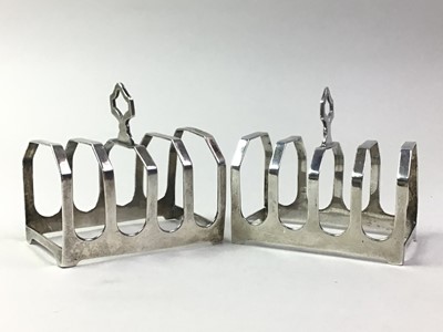 Lot 578 - PAIR OF GEORGE V SILVER TOAST RACKS