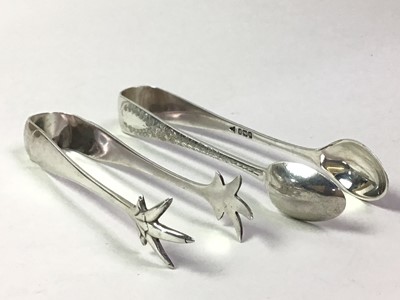 Lot 579 - TWO SILVER SUGAR TONGS